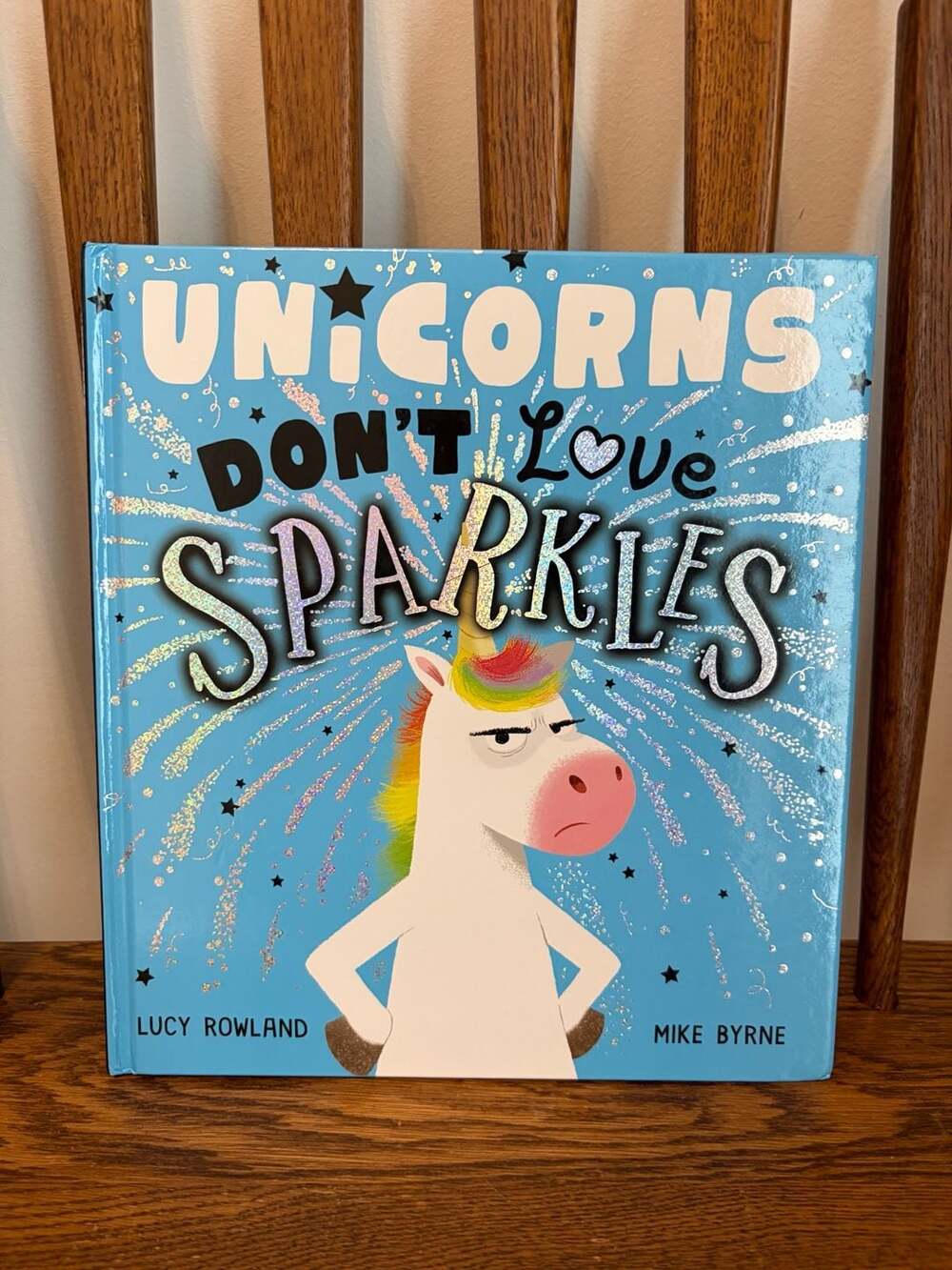 Unicorns Don't Love Sparkles Hardcover Picture Book by Lucy Rowland